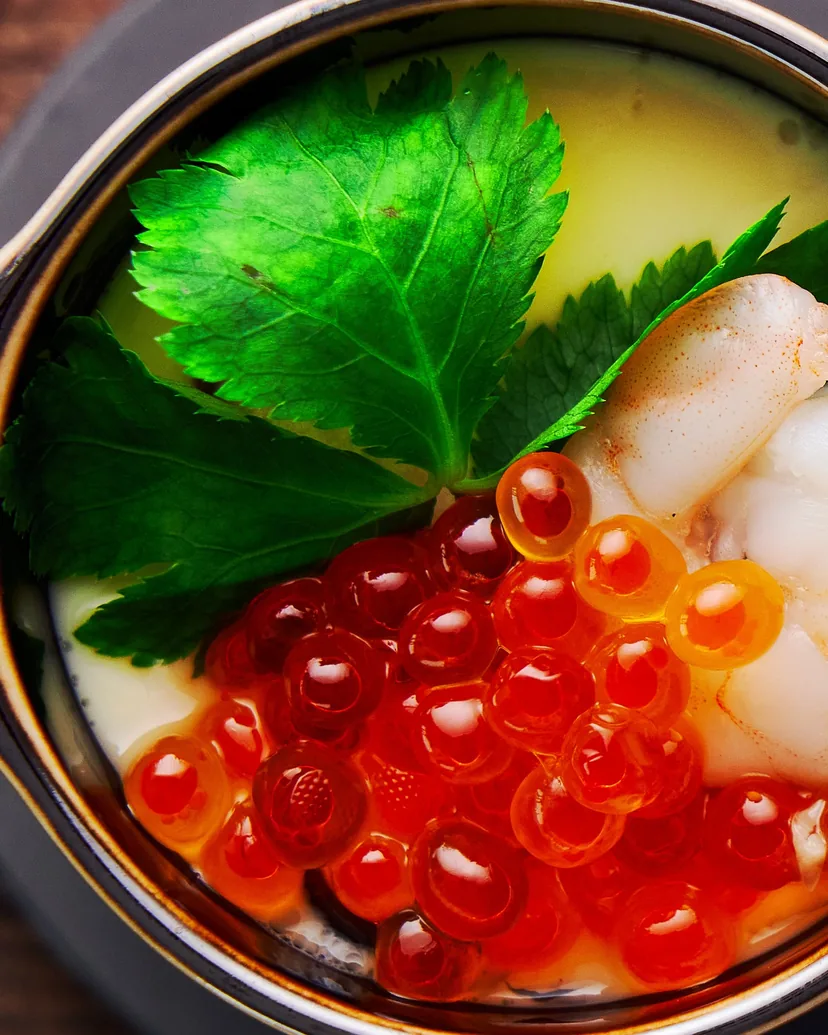 Steamed egg custard topped with salmon roe, shrimp and mitsuba leaves