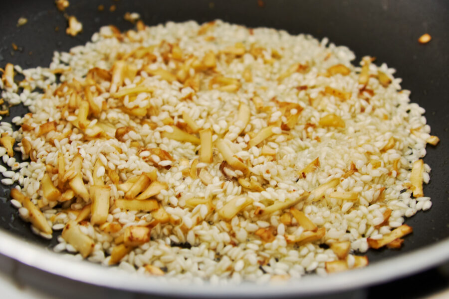 Rice gets a coating of butter and oil.