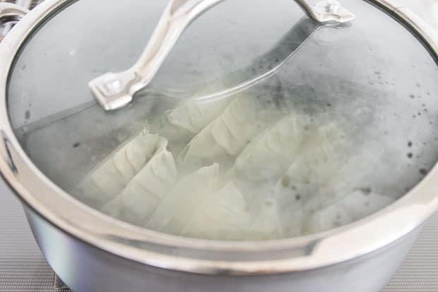Steaming the gyoza.