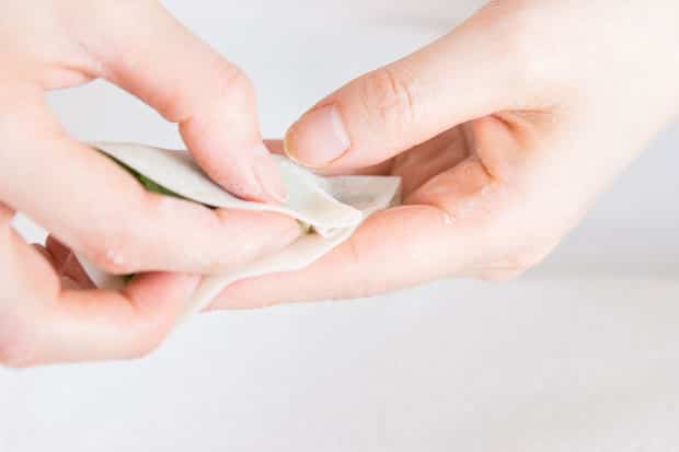 Folding pleats.