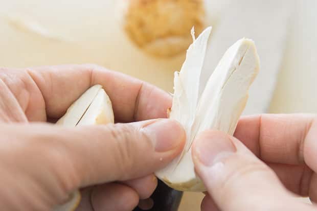 Splitting the mushrooms.