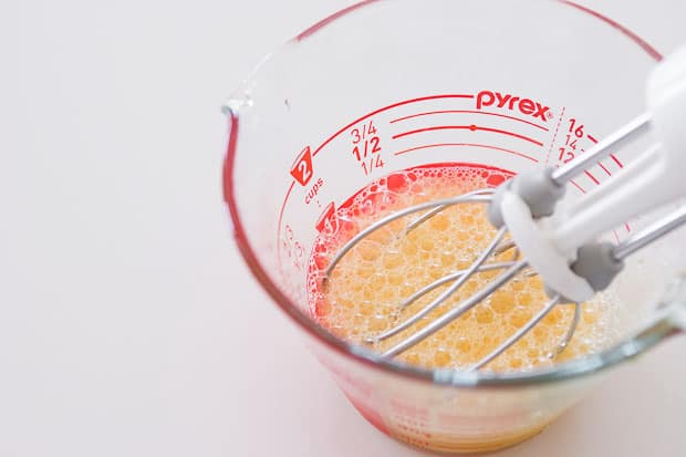 Beat eggs, salt, sugar.