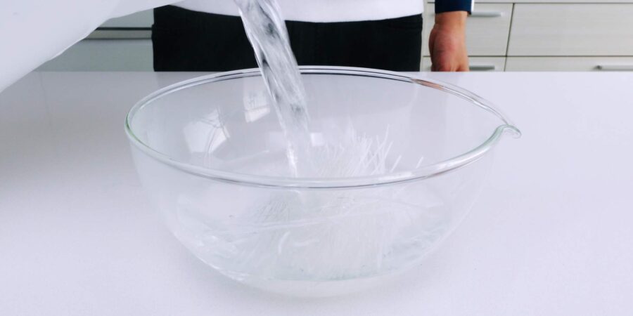 Rehydrating glass in noodles with boiling water.