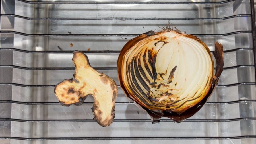 Charred onion and galangal.