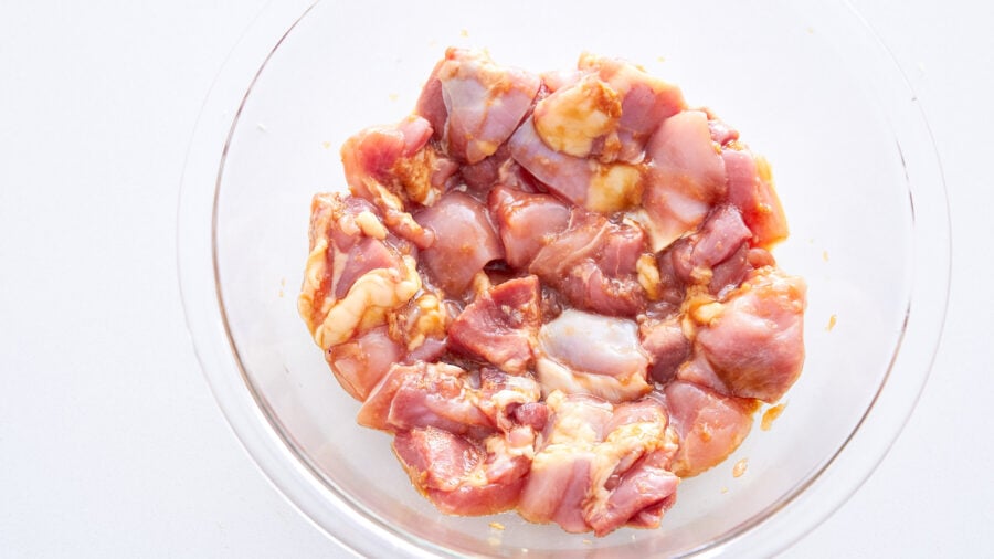 Marinate the chicken in soy sauce, sake and ginger for the best orange chicken.
