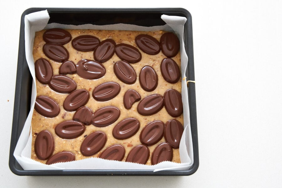 Melt the chocolate on top of the warm toffee.