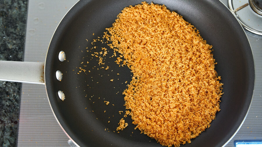 Kerisik, or roasted coconut is an essential component in Chicken Rendang.
