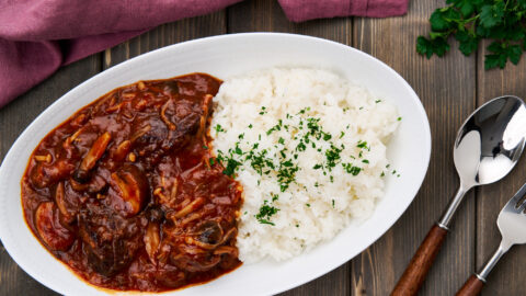 Hayashi rice with tender cubes of beef stewed with mushrooms and onions in a savory, sweet, and tangy sauce served with rice.