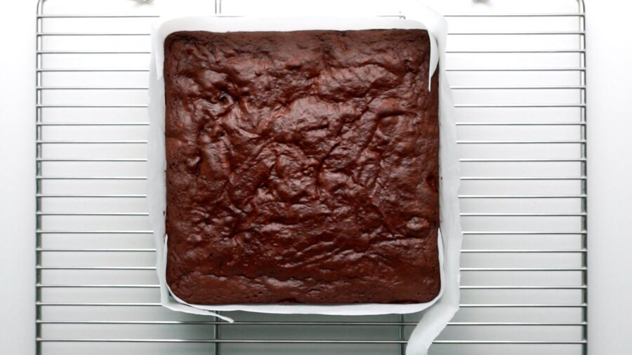 Chocolate Cherry Brownies cooling on a rack.