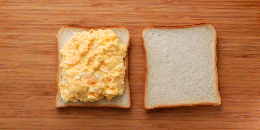 Japanese sandwich bread topped with egg salad.