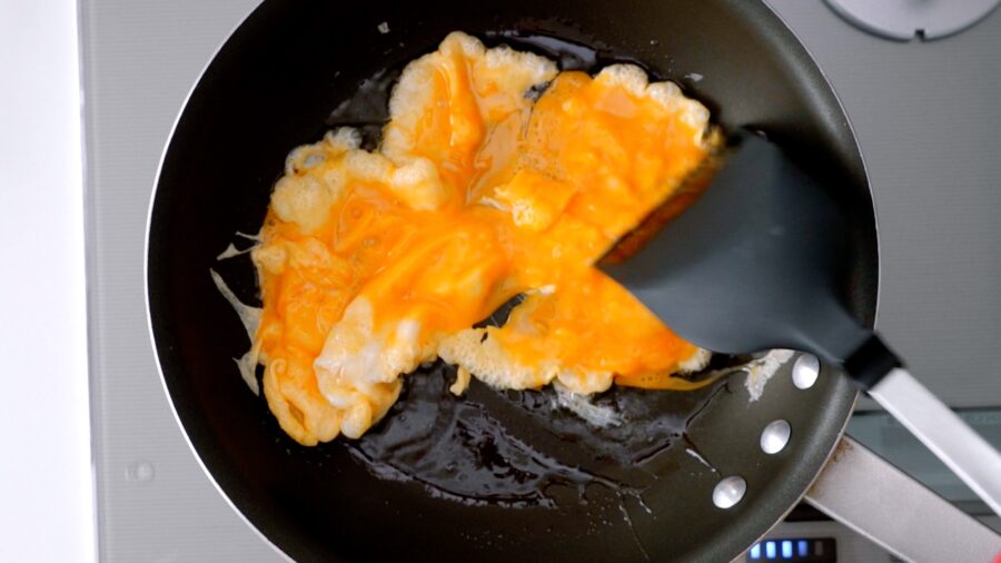 Scrambling egg for fried rice.