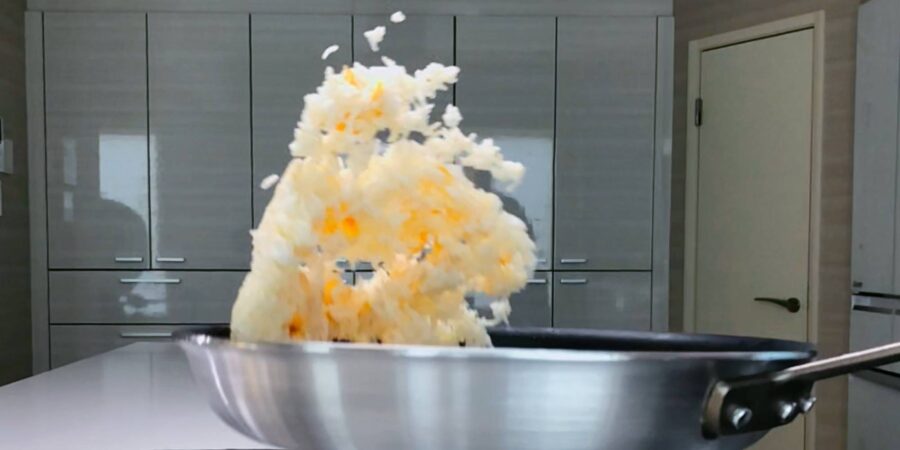 Tossing Egg Fried Rice.