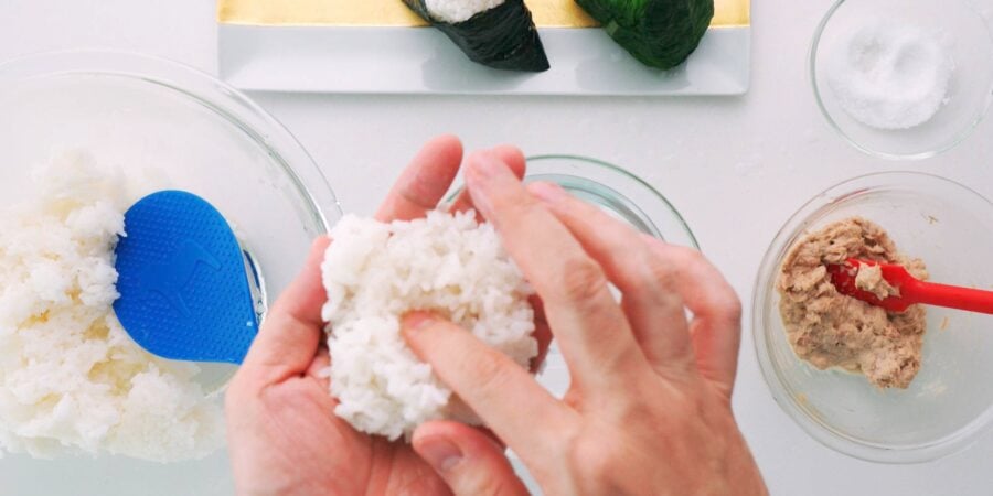 Poke a well in the middle of the mound of rice to hold the filling.