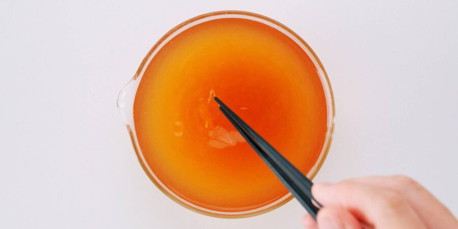 Chicken broth for chicken udon noodle soup.