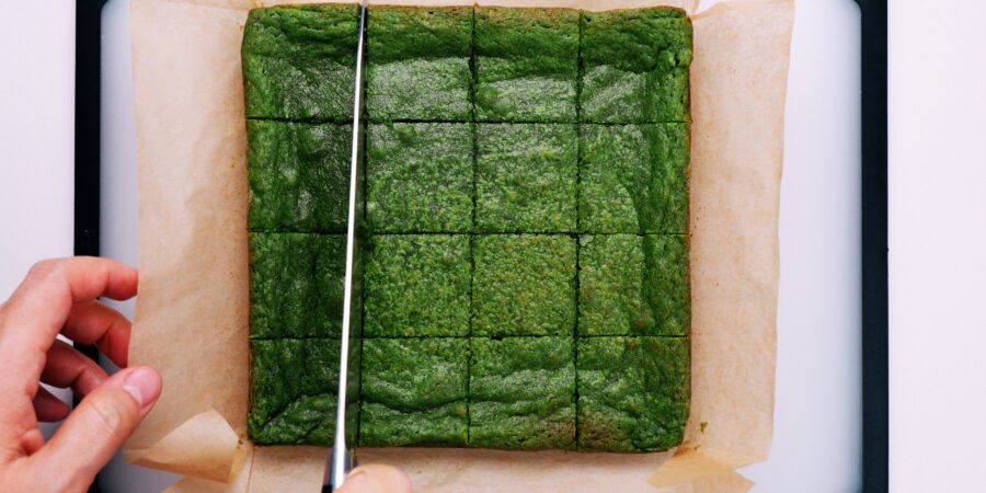 Cutting green tea matcha brownies.