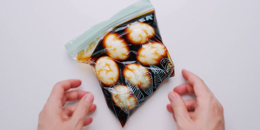 Ramen eggs, or Japanese soft-boiled eggs marinating in a zipper bag.