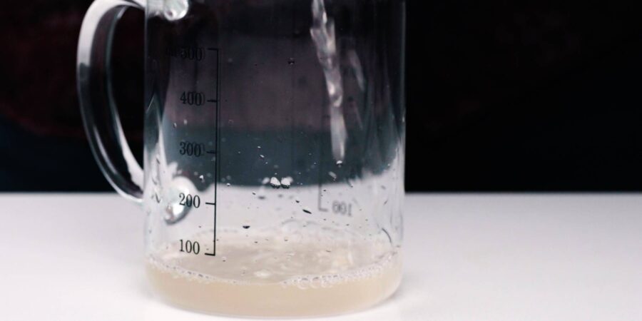 Removing excess water from carrots and daikon.
