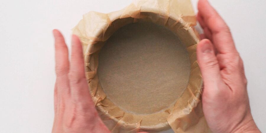 Line a 6-inch cake pan with parchment paper.