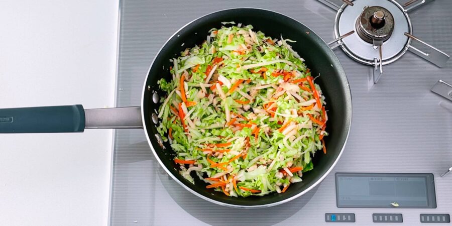 Shredded cabbage, carrots, mushrooms and bamboo for making Japanese-style spring rolls.