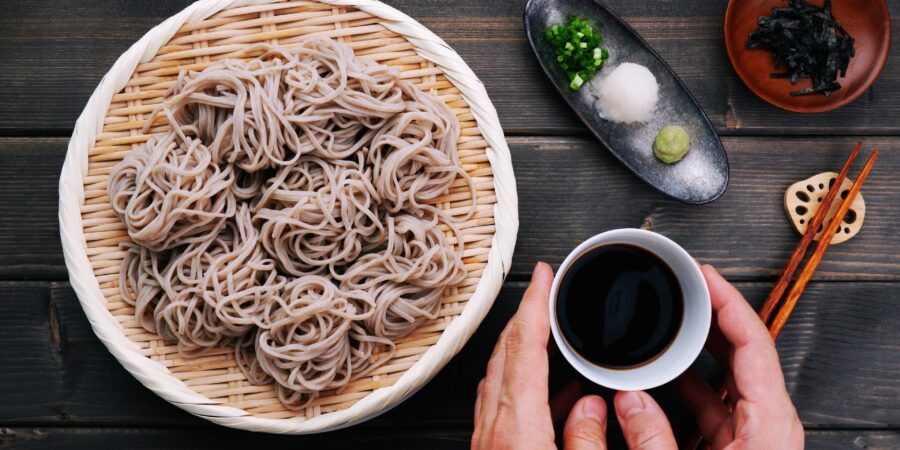 Serving Zaru Soba with dipping sauce and condiments.
