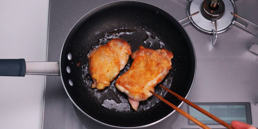 Pan-fry the chicken until cooked through.