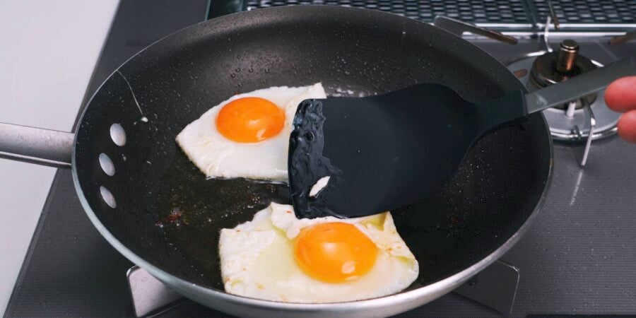 Fry the eggs for the sandwich over-easy