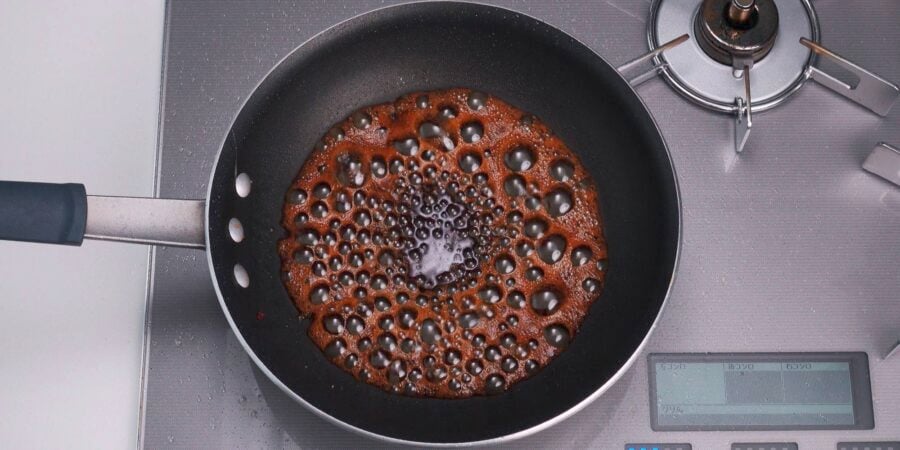 Reduce the teriyaki sauce until it is thick and bubbly.