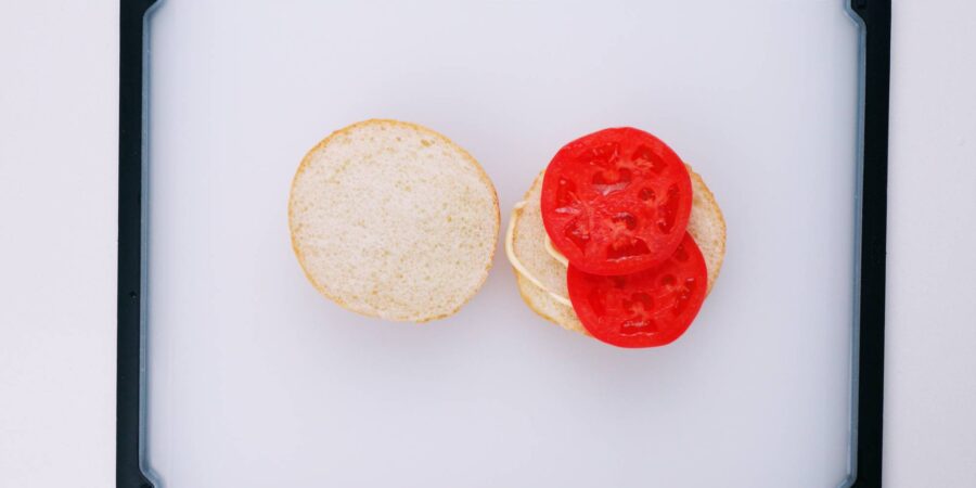 Top with sliced tomatoes.