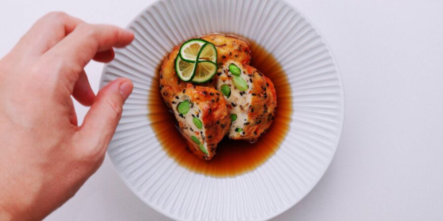 Plate the tofu patties and ladle on the broth.