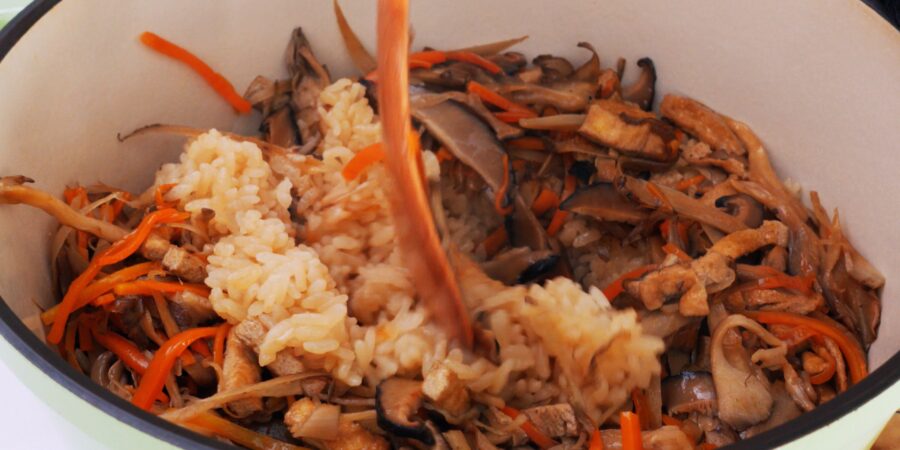 Mix the mushrooms and veggies into the rice.