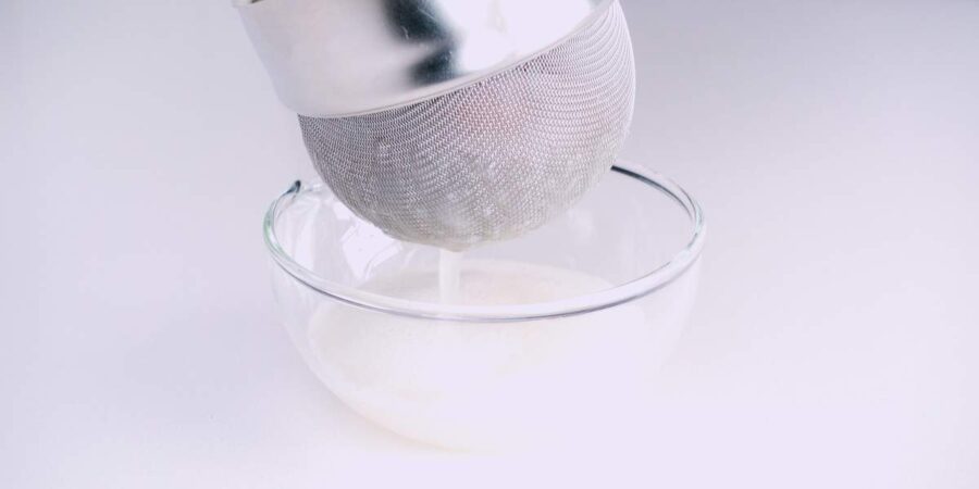 Draining liquid from daikon.