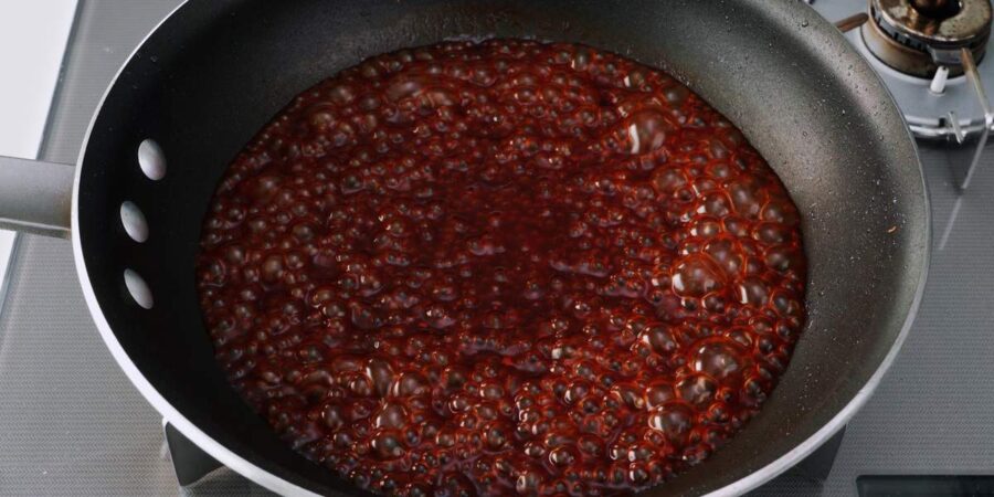 Japanese steak sauce boiling in a pan.