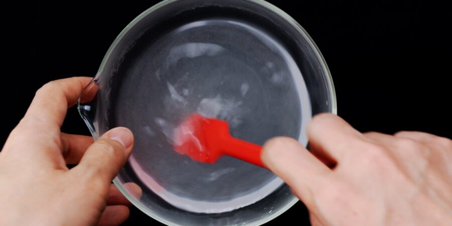 Dissolving salt in warm water.