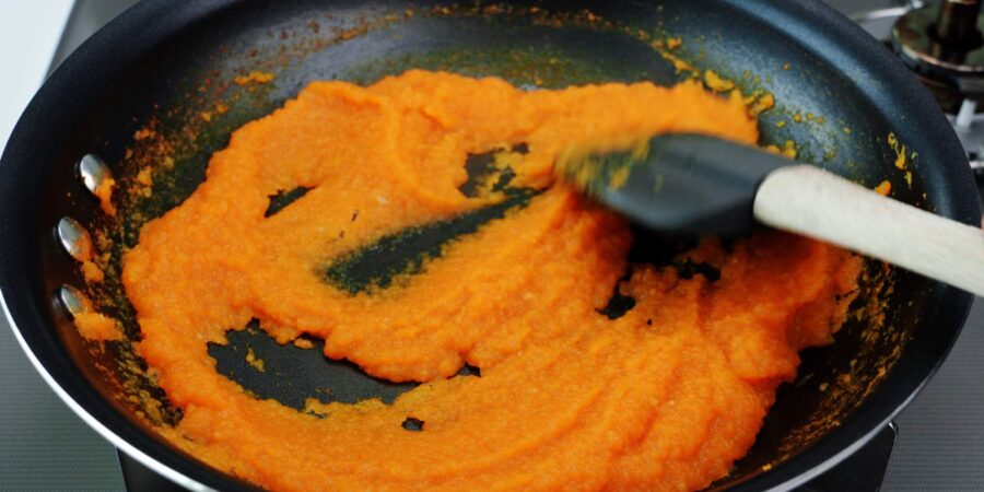 Reducing onion and carrot puree to make Japanese curry sauce.