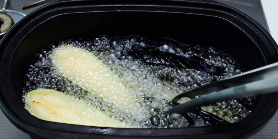 Frying eggplant.