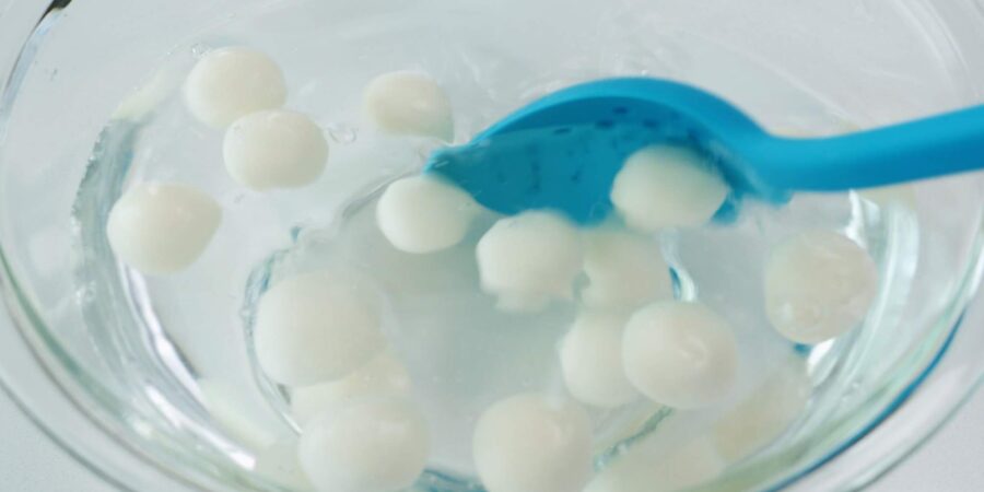 Chilling dango in cold water.