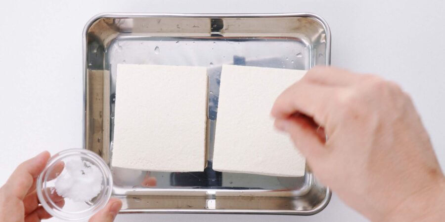 Salt tofu before pressing it.
