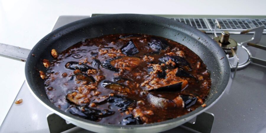 Braising eggplant in Mapo Tofu sauce.