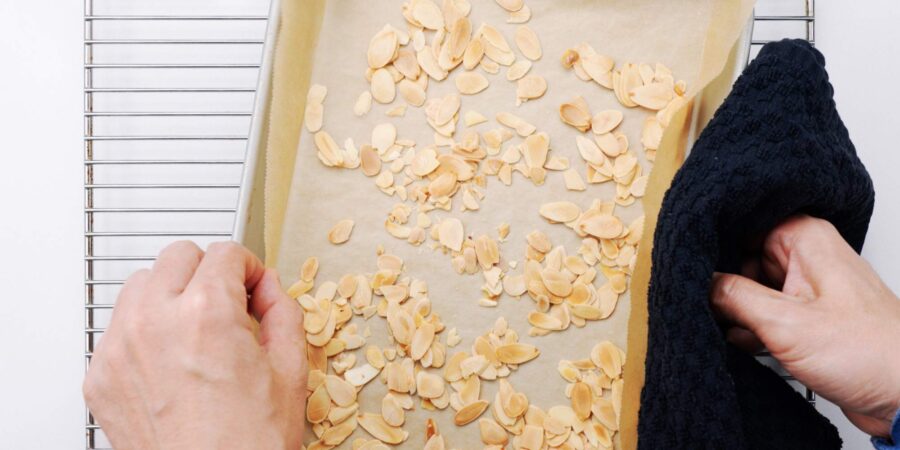 Toasted almonds on a baking sheet.