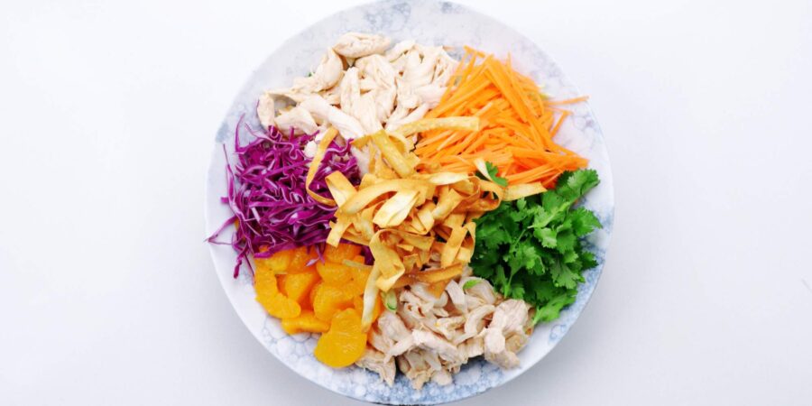 Chinese chicken salad topped with crispy wonton strips.