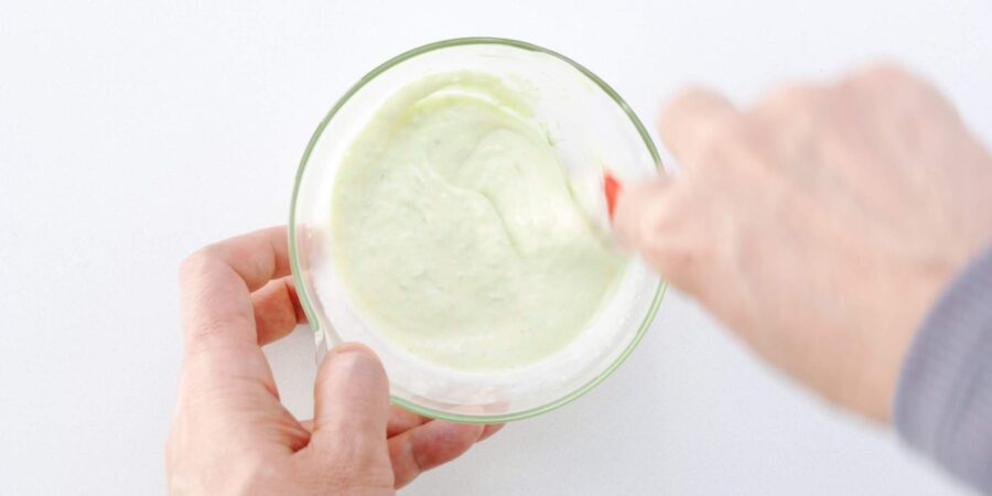 Mixing wasabi cream sauce.