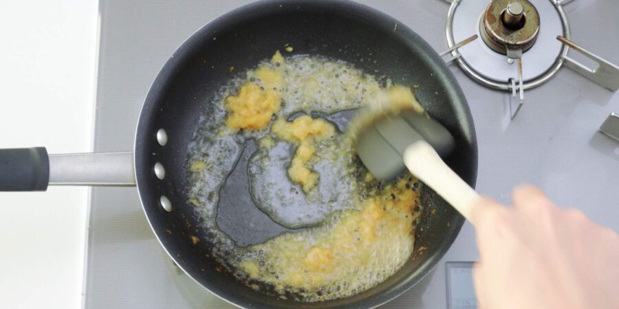 Deglazing pan with sake.