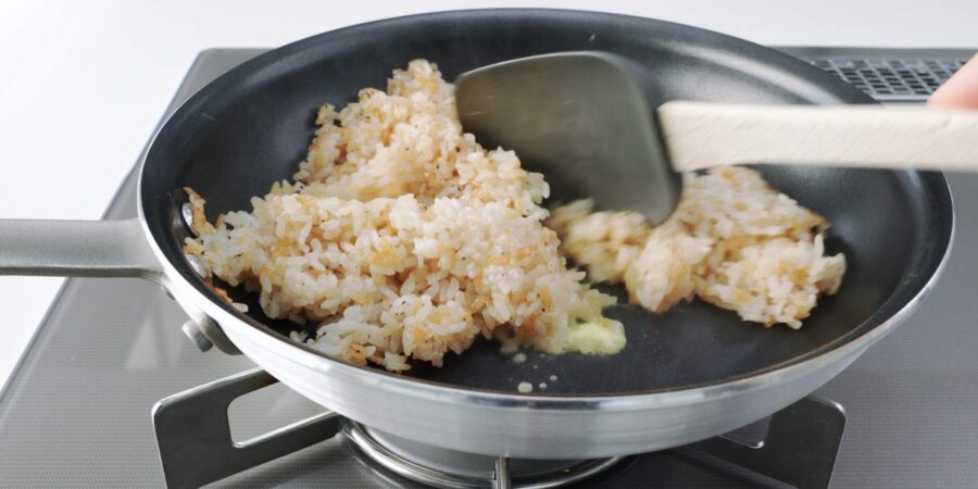 Garlic fried rice with garlic butter in a pan.