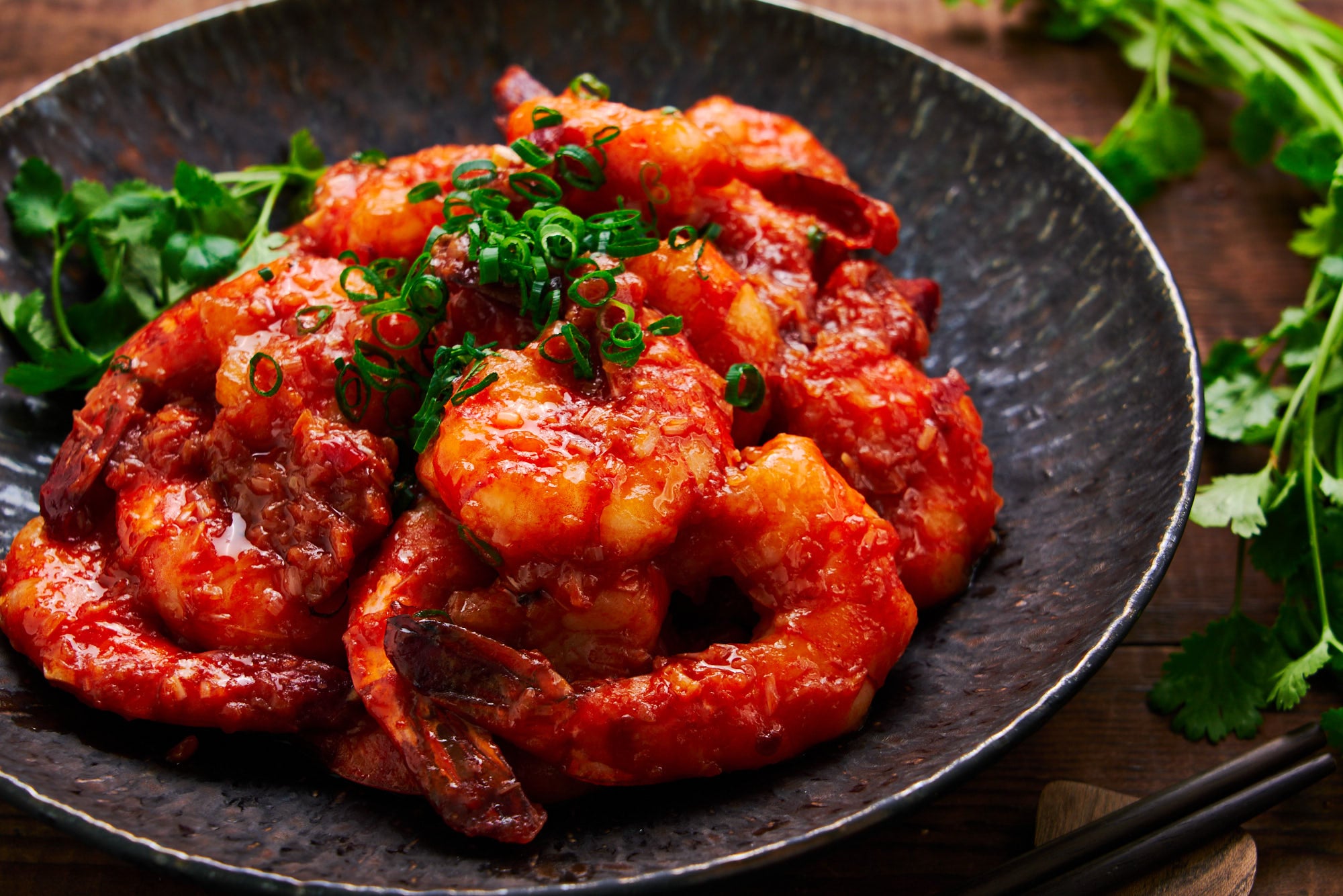 This easy Ebi Chili is a Japanese-style Sichuan classic with plump, springy shrimp coated in a sweet and spicy chili sauce made of doubanjiang and ketchup.