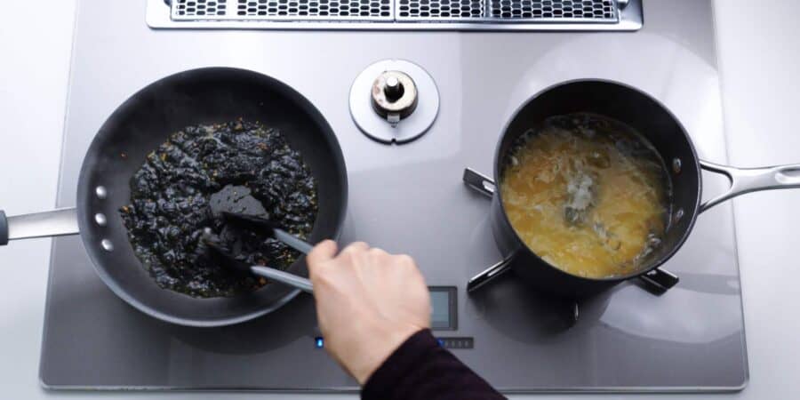 Mixing nori sauce for for Japanese shrimp pasta.