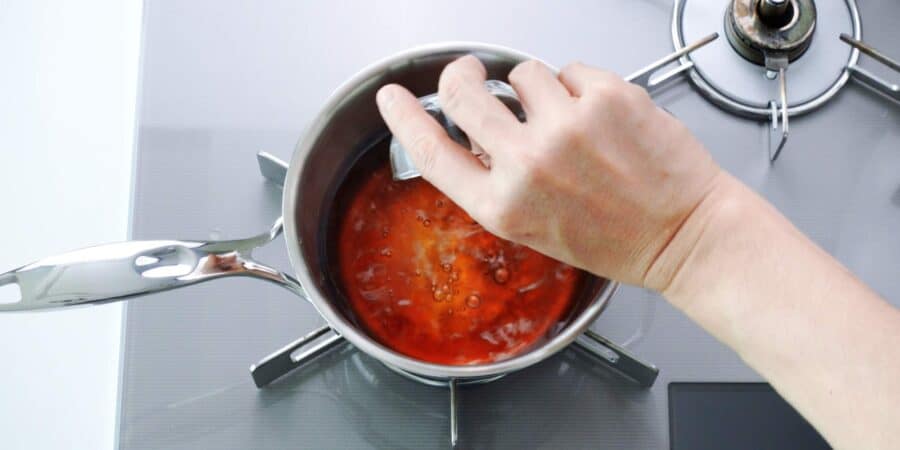 Making dashi broth for somen dipping sauce.