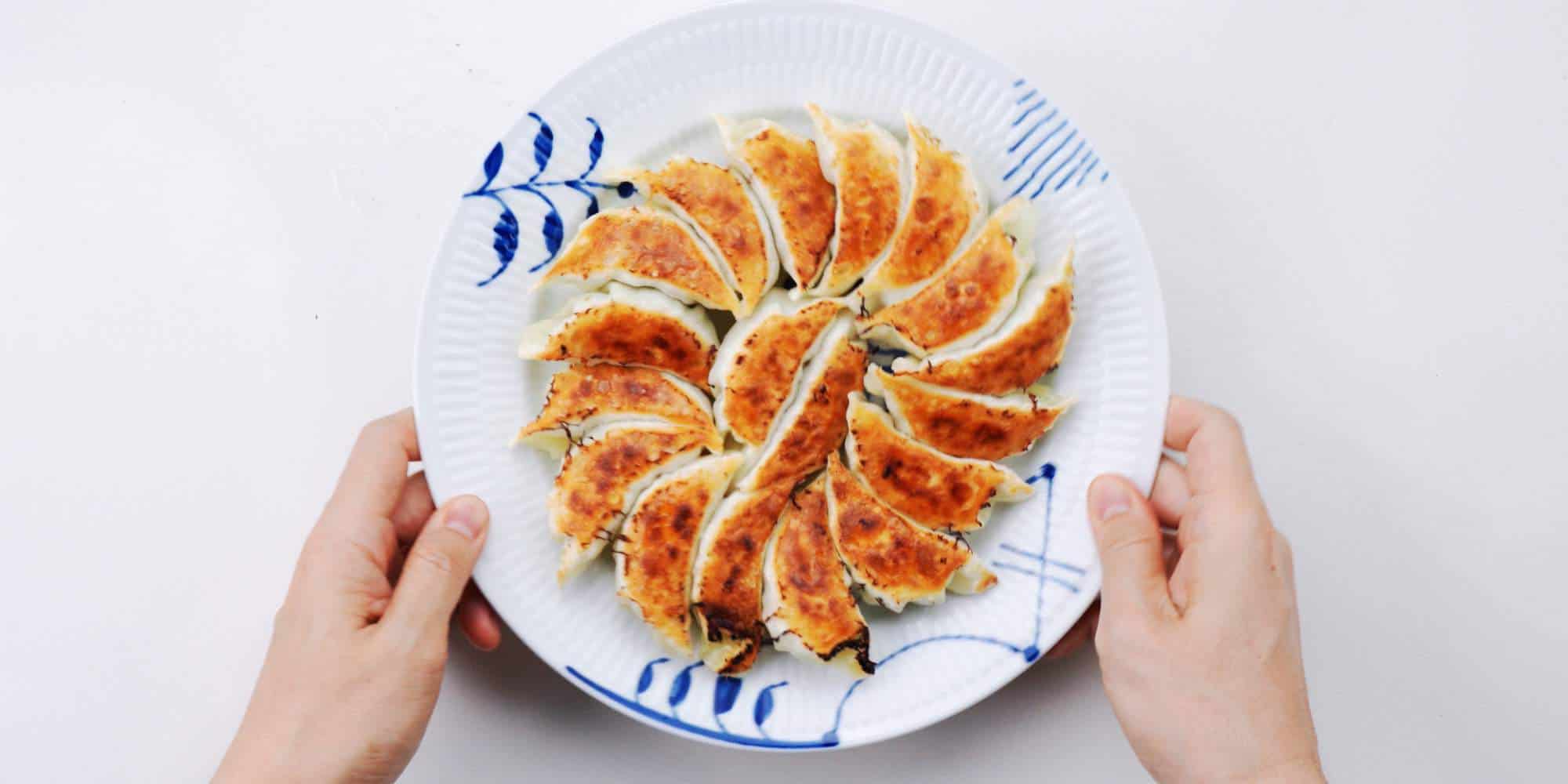 Plating gyoza with the crispy side up. - 6