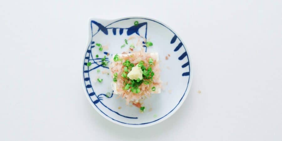 Cold silken tofu topped with katsuobushi, scallions, and grated ginger.