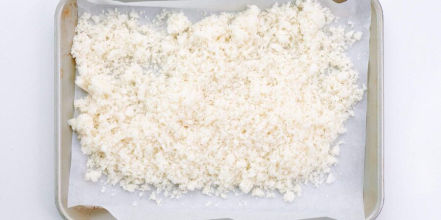 Japanese panko bread crumbs on a baking sheet.