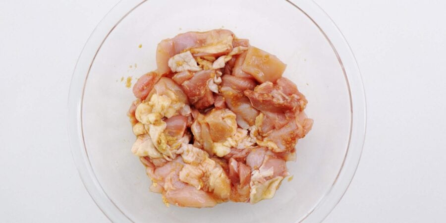 Marinating chicken thighs for Hunan Chicken.
